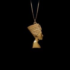 Elevate your style with our 14k Gold Nefertiti Pendant. This solid gold necklace showcases exquisite craftsmanship, symbolizing the beauty and royalty of ancient Egypt. The 14 karat gold Nefertiti pendant is more than just jewelry; it's a fine representation of historical elegance and the allure of Egyptian culture, also available in 18k yellow gold. PENDANT INFORMATIONThis pendant is made of real, solid gold.• Made in USA• Material: 14k or 18k solid gold• Finish: polished• Height: 1.2" (30 mm) Nefertiti Pendant, Nefertiti Necklace, Egyptian Culture, Solid Gold Necklace, Elegant Jewelry, Ancient Egypt, Gold Finish, Gold Pendant, Handcrafted Jewelry