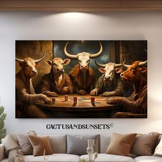 three bulls playing cards at a table in front of a wall mounted art piece with the captioned caption capturans sunsets