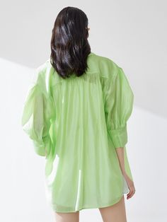 MO&Co. Women's Puff Sleeve Pocket Shirt - Classic shirt x puff mid-sleeve design- Large 3D flap pocketCode : MBB2SHT015&MBC2SHTT13Length of size M is 73cmWhite : Model is 175cm tall and wearing a size M MATERIALS & CARE : Material : 83.3% Lyocell 16.7% PolyesterHand wash separately below 30°CDo not machine wash, do not bleachHang to dry in the shade, do not dryIron at low temperature, do not soakWash with neutral detergentPlease select your own size in the size chart according to your figure and Daywear Shirt With Puff Sleeves, Puff Sleeve Blouson Shirt For Daywear, Oversized Puff Sleeve Top With Gathered Sleeves, Oversized Tops With Gathered Puff Sleeves, Relaxed Fit Tops With Gathered Sleeves And Button-up, Relaxed Fit Button-up Tops With Gathered Sleeves, Solid Color Tops With Blouson Short Sleeves, Casual Green Tops With Gathered Sleeves, Casual Shirt With Blouson Sleeves For Daywear