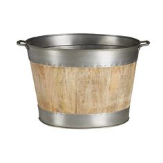 a metal bucket with wood in it on a white background