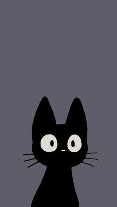 a black cat with big eyes sitting down