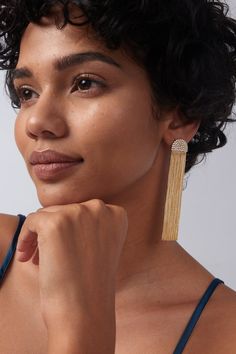 Dazzle all night long with these Aeris tassel drop earrings! These shimmering tassel drop earrings make a statement at any party, leaving you shining like a star! Way more than just minimalist chic, these earrings are water-proof and tarnish-proof. Make a statement without saying a word - these earrings were made for luxury. ………………………………….D E T A I L S• Materials: Stainless steel, 18k gold plating, cubic zirconia• Length: 7cm (2.7 inches)• Width: 1.7cm (0.7 inches)• Weight: 14g/pair• This produc Elegant Long Drop Chandelier Earrings With Tassels, Elegant Long Drop Tassel Chandelier Earrings, Elegant Tassel Earrings For Party, Elegant Evening Tassel Drop Earrings, Evening Long Drop Tassel Earrings, Glamorous Tassel Jewelry For Evening, Tassel Drop Earrings For Evening, Linear Tassel Dangle Earrings, Elegant Fringe Drop Earrings