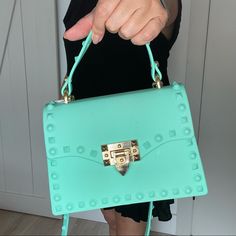 Beautiful Tote Bag In Silicone For Easy Breezy Beach Looks! Fits A An Iphone 12 Pro Or Smaller. Trendy Turquoise Tote Bag, Green Vacation Bag With Detachable Strap, Green Bags With Detachable Strap For Vacation, Green Bag With Detachable Strap For Vacation, Turquoise Crossbody Bag With Detachable Strap, Trendy Rectangular Turquoise Shoulder Bag, Trendy Turquoise Rectangular Shoulder Bag, Elegant Green Beach Bag, Green Beach Bag With Mobile Phone Holder