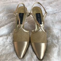 Brand New, Never Worn Stuart Weitzman Slingback Heels. Beautiful Gold Color With Some Sheer Covering With Gold Shimmer. Very Sophisticated Shoes For Evening Wear Or That Special Occasion. Heel Is 2” Size: 7 Aa Elegant Slingback Pumps With 4-inch Heel For Formal Occasions, Fitted Slingback Pumps With 4-inch Heel For Gala, Elegant Closed Toe Slingback Pumps With 4-inch Heel, Glamorous Pointed Toe Slingback Pumps For Dinner, Elegant 4-inch Kitten Heels For Evening, Glamorous Leather Slingback Pumps For Formal Occasions, Designer Gold Slingback Pumps For Evening, Elegant High Heel Slingback Pumps For Dinner, Elegant Slingback Pumps For Dinner With Pointed Toe