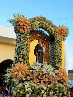 an elaborately decorated float in the shape of a person