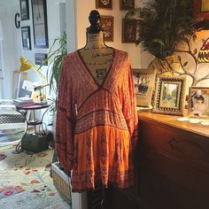 Free People Midi Dress Smock Type V Neck Bohemian Look Paisley Print The Sleeves Are Full With Elastic Around The Wrist Brand New Super Cute...Pit To Pit Is 18 Inches And Length Is 32 Inches Flowy V-neck Peasant Boho Dress, Long Sleeve Orange Tunic For Summer, Orange Long Sleeve Boho Dress, Orange Long Sleeve Bohemian Dress, Bohemian Mini Dress With Boho Print For Brunch, Orange Boho Dress With Floral Print, Orange Bohemian Boho Dress With Floral Print, Orange Long Sleeve Festival Dress, Orange Long Sleeve Dress For Festival