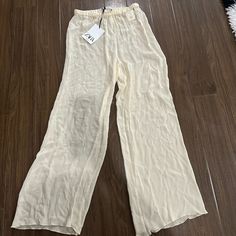 Zara Studio Transparent Beige Pants Sheer Trousers Bottoms For Spring, Chic Sheer Trousers, Sheer Trousers For Spring, Chic Sheer Long Pants, Sheer Beige Bottoms For Summer, Sheer Beige Bottoms For Spring, Sheer Summer Pants, Chic Sheer Wide Leg Bottoms, Chic Sheer Spring Bottoms