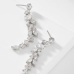 ABOUT THE PRODUCTIt's all about the sparkle with these dramatic and intricate long linear earrings featuring a variety of sizes of CZ stones. Metal: BrassPlating: RhodiumStones: Cubic Zirconia Length: 2 1/8 inWidth: 1/4 in Cubic Zirconia Long Drop Linear Earrings, Long Drop Cubic Zirconia Crystal Earrings, Elegant Crystal Linear Earrings With Sparkling Stones, Crystal Linear Long Drop Earrings For Party, Glamorous Silver Crystal Linear Earrings, Glamorous Long Drop Chandelier Earrings With Cubic Zirconia, Glamorous Long Drop Cubic Zirconia Chandelier Earrings, Crystal Linear Drop Earrings With Sparkling Stones, Long Drop Crystal Earrings With Sparkling Stones