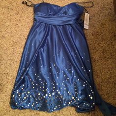 Royal Blue Homecoming Dress. Spaghetti Strap. Silver Dot Details At Bottom. Never Need Worn. Royal Blue Spaghetti Strap Prom Dress, Blue Strapless Dress For Party Season, Blue Strapless Dress With Sweetheart Neckline For Prom, Blue Fitted Strapless Dress For Homecoming, Blue Strapless Dress For Homecoming Prom Season, Blue Strapless Dress For Party Season Night Out, Blue Spaghetti Strap Dress For Casual Wear, Blue Casual Strapless Dress, Blue Spaghetti Strap Casual Dress