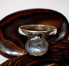 "\"\"Giglirigli Gems\"\" Welcomes you \"\"Exquisite Moonstone Ring Size 7, Gemstone Ring, White Band Ring, 925 Sterling Silver Jewelry, Birthday Gift, Ring For Her\"\" Gemstone : Moonstone Metal : 925 Sterling Silver Moonstone Pendants https://www.etsy.com/shop/Giglirigligems?ref=seller-platform-mcnav&search_query=Moonstone+pendants Moonstone Earrings https://www.etsy.com/shop/Giglirigligems?ref=seller-platform-mcnav&search_query=Moonstone+earrings Moonstone Ring https://www.etsy.com/shop/Giglirigligems?ref=seller-platform-mcnav&search_query=Moonstone+ring A complete hub of Silver/Gold Jewelry & Gemstone Manufacturing Our Ability - 1000 Pieces per week &CAD/CAM Designing,Wire Wrapped Jewelry ,Rhodium Plating ,Micron plating,Grain Setting etc We are any Design as per your Requirement Paymen Luxury Adjustable Moonstone Ring In Sterling Silver, Luxury Adjustable Sterling Silver Moonstone Ring, Luxury Silver Bohemian Moonstone Ring, Adjustable Sterling Silver Moonstone Ring, Fine Jewelry, Spiritual Sterling Silver Cabochon Moonstone Ring, Silver Gold Jewelry, Moonstone Earrings, White Band, Moonstone Pendant