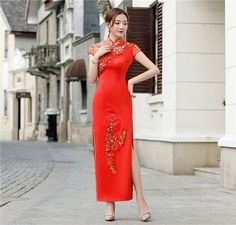 Formal Long Red Cheongsam, Fitted Red Cheongsam For Evening, Traditional Red Evening Dress, Elegant Red Cheongsam, Red Fitted Summer Cheongsam, Red Summer Dress With Stand Collar, Traditional Red Cheongsam For Formal Occasions, Festive Traditional Cheongsam With Short Sleeves, Festive Traditional Short Sleeve Cheongsam