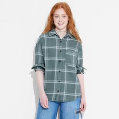 Flannel button-down shirt from Wild Fable™ with a plaid pattern. Made from lightweight cotton. Designed in an oversized fit with a collared neckline, full front button-down closure, chest patch pocket and long sleeves with buttoned cuffs. Tunic-length shirttail hem completes the stylish look. If you're not satisfied with any Target Owned Brand item, return it within one year with a receipt for an exchange or a refund. Wild Fable™: A look for every story. Casual Cotton Flannel Shirt For Daywear, Spring Collared Flannel Shirt, Spring Flannel Collared Shirt For Everyday, Everyday Spring Collared Flannel Shirt, Casual Plaid Flannel Shirt For Spring, Plaid Flannel Shirt For Spring, Spring Everyday Collared Flannel Shirt, Plaid Flannel Shirt For Everyday Spring Wear, Relaxed Fit Flannel Shirt For Everyday