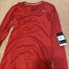 Brand New Nike Tee Nike Casual Top In University Red, Red Athleisure Top For Fall, Red Long Sleeve Athleisure Top, Nike Workout Tops For Fall, Nike Sporty Tops In University Red, Nike Sporty University Red Tops, Nike Red Sporty Tops, Nike Sporty Red Top, University Red Sporty Top For Spring