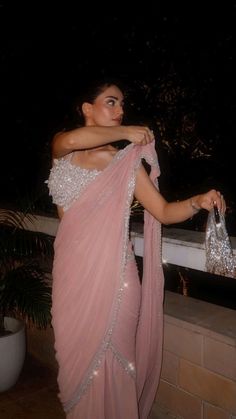 Pink Saree With Mirror Work, Diwali Evening Saree With Draped Sleeves, Evening Georgette Pre-draped Saree With Side Open, Evening Saree With Sheer Dupatta And Side Open, Pink Pre-draped Saree With Zari Work For Evening, Embellished Side Open Pre-draped Saree, Pink Pre-draped Saree With Mirror Work For Evening, Side Open Pre-draped Saree For Diwali Party, Drape Sari