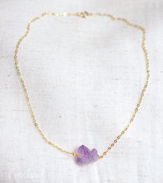 This necklace is handcrafted with a natural, untreated, pale purple Amethyst crystal. Each crystal is different from the next in shape, size, and formation. It will be made in your choice of sterling silver or 14kt gold filled. The stone size averages 15mm (.59"). Amethyst, the birthstone for February, is believed to be a powerful protective stone that helps to awaken your soul and realize your life's purpose! It's said to aid in ending addictions and blockages, while attracting positive energy Gold Amethyst Crystal Necklace With Natural Stones, Gold Amethyst Gemstone Crystal Necklace, Everyday Purple Amethyst Necklaces, Life's Purpose, Purple Heart-shaped Amethyst Necklaces, Amethyst Crystal Necklace, Gold Amethyst Crystal Necklace, Faceted, Pale Purple, Secret Sale