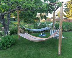 a hammock and chair in a yard