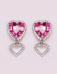 Our Boutique Heart Jewel Clip-On Earrings are the perfect accessory to add a touch of elegance to your look! The centerpiece of these earrings is a mesmerizing heart-shaped jewel, delicately adorned in a captivating shade of pink and surrounded by beautiful rhinestones & finished with a drop heart. Its lustrous surface reflects light from every angle, showcasing its brilliance and creating a dazzling effect. Whether you have pierced ears or prefer not to pierce them, these earrings are perfect f Pink Heart-shaped Crystal Earrings For Valentine's Day, Pink Heart Cut Earrings For Party, Pink Heart Crystal Earrings For Valentine's Day, Pink Crystal Earrings For Valentine's Day, Elegant Pink Heart Cut Earrings, Heart Cut Earrings With Heart Charm For Party, Pink Heart Cut Earrings For Anniversary, Glamorous Heart Shaped Earrings For Valentine's Day, Glamorous Heart Earrings For Valentine's Wedding