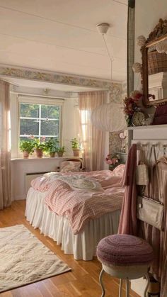 a bed room with a neatly made bed next to a chair and mirror on the wall