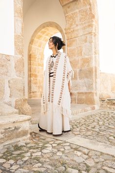 Adopt a bohemian loose-fit look with this ivory-colored tribal kimono in 100% cotton. Ideal for cooler summer nights, festivals or ceremonies. Mixed model, suitable for men and women.  ༶ ༶ ༶ ༶ ༶ ༶ ༶ ༶ ༶ ༶ ༶ ༶ ༶ ༶ ༶ ༶ ༶ ༶ ༶ ༶ ༶ ༶ ༶ ༶ ༶ ༶ ༶ ༶ AVAILABILITY The kimono is available in other earthy colors :  - Brown Color : https://www.etsy.com/listing/1781191615 - Rust Color : https://www.etsy.com/listing/1766994078 ༶ ༶ ༶ ༶ ༶ ༶ ༶ ༶ ༶ ༶ ༶ ༶ ༶ ༶ ༶ ༶ ༶ ༶ ༶ ༶ ༶ ༶ ༶ ༶ ༶ ༶ ༶ ༶ MEASUREMENTS DETAILS Our prod Oversized Bohemian Outerwear With Fringe, Bohemian Shawl Cape For Fall, Beige Bohemian Winter Cape, Beige Bohemian Shawl Poncho, Bohemian Beige Kaftan For Festival, Bohemian Beige Poncho Cape, Bohemian Fringe Cape Poncho, Bohemian Beige Outerwear For Festival, Beige Long Sleeve Bohemian Cape