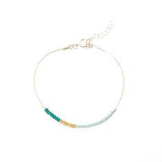 Our handmade Dusk Bracelet, lovingly crafted in our Texas studio, is part of the Desert Sunset collection. This understated modern piece draws inspiration from the breathtaking colors that grace the desert sky at dusk. We meticulously handcraft each piece with utmost care and attention to detail. Using a delicate blend of hand-beaded Japanese glass beads, we carefully selected colors that reflect the serene hues of the desert sunset. The result is a mesmerizing pattern that evokes a sense of tra Handmade 14k Gold Filled Bohemian Bracelet, Handmade 14k Gold-filled Bohemian Bracelet, Handmade Bohemian 14k Gold-filled Bracelet, Everyday Tiny Beads Bracelet, Modern Hand-strung Jewelry For Gifts, Handmade Minimalist Bracelets, Modern Jewelry With Tiny Beads, Minimalist Handmade Bracelets For Everyday, Modern Everyday Jewelry With Tiny Beads