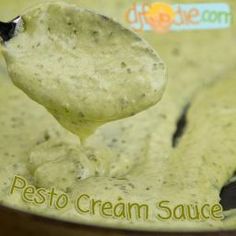 a spoon full of pesto cream sauce