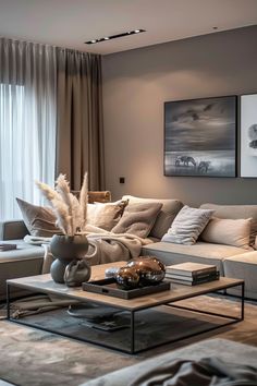 a living room filled with lots of furniture next to a window covered in drapes