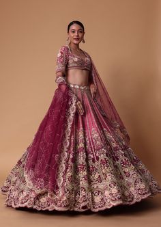 Introducing our exquisite red velvet raw silk lehenga set that will help you exude elegance and charm on your D day. Featuring a choli cut blouse in a soft coral hue that is enhanced with stunning zardosi work. Crafted with meticulous attention to detail this set of four ensemble that is complemented with two whimsical dupattas will accentuate your curves with grace and sophistication. Dry clean only if required. Slight variation in color is possible due to digital photography. Choli Cut Blouse, Trending Lehenga Designs, Crystal Blouse, Latest Bridal Lehenga, Raw Silk Lehenga, Zardosi Work, Cut Blouse, Wedding Lehenga Designs, Lehenga Designs Simple