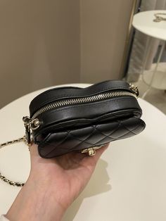 Chanel 22S Heart BagBlack Stiff Lambskin LGHWSmall 12 x 11.5 x 4 cmStrap drop 56 cm31 series9.9/10 New Kept Unused (inevitable scratch on hardware knob otherwise new)Includes box, dust bag and ity cardPrice now 4999 sgd 3850 usd CN5164-01 Designer Bags Louis Vuitton, Quilted Wallet, Burberry Sunglasses, Heart Bag, Coach Bag, Carry All Bag, Vintage Chanel, Classic Flap, Black Tote Bag