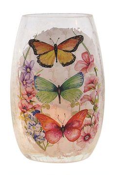 a glass vase with butterflies and flowers painted on it