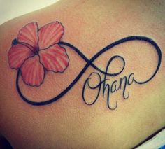 an image of a woman's tattoo with the word hope and a flower on it