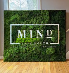 a green wall with the words mind on it