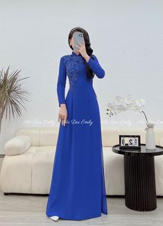 🌻Material: chiffon. 🌻Stretchy level: 3/10 🌻 The measurement of this ao dai (long dress) is in Vietnamese size (American size tends to be bigger for the same size). Please LOOK AT THE SIZE CHART CAREFULLY BEFORE ORDERING. There might have some chalk writings on the fabric due to making process. These marks can be washed away easily. 🌻🌻No returns or exchanges Buyer can contact seller about any issues with an order. 🌸 Follow us Facebook/aodaiemily www.aodaiemily.com 💜 Thank you very much!💜 Elegant Georgette Dress For Ceremony, Long Cheongsam For Wedding And Festive Occasions, Festive Long Cheongsam For Wedding, Long Festive Wedding Cheongsam, Georgette Dresses For Ceremonies, Elegant Blue Ao Dai For Formal Occasions, Elegant Long Sleeve Georgette Gown, Elegant Ao Dai For Formal Festive Occasions, Elegant Ao Dai For Festive Formal Occasions