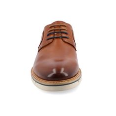 The William derby shoe from Vance Co. seamlessly blends sophistication and comfort with its 1-inch heel, lace-up closure, and classic round toe design. Crafted from faux leather this style offers a stylish choice for various occasions. The mesh lining, 6 mm Tru Comfort Foam™ footbed, and rubber outer sole ensure breathability, comfort, and support, making the William a versatile and conscientious addition to your footwear collection. Brown Lace-up Derby Shoes For Business, Goodyear Welted Lace-up Oxfords For Business Casual, Classic Brown Lace-up Derby Shoes, Business Derby With Leather Sole And Lace-up, Almond Toe Oxfords With Leather Footbed For Derby, Semi-formal Lace-up Derby With Leather Sole, Goodyear Welted Derby Shoes For Business Casual, Goodyear Welted Business Casual Derby Shoes, Oxford Lace-up Shoes With Leather Sole For Derby