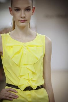 Bright yellow chiffon top, decorated with flounces, yellow ribbon and handstiched beads. Sleeveless. Loose fit.Size 42/12  (bust 96cm/37,8in, waist 78cm/30,7in)Back lenght: 57cm/22,3inMaterials utilised100% Polyester chiffonYellow ribbon.Long beads. Sleeveless Chiffon Blouse With Ruffles, Sleeveless Ruffled Chiffon Blouse, Sleeveless Ruffled Chiffon Top, Sleeveless Chiffon Ruffle Top, Sleeveless Chiffon Top With Ruffles, Sleeveless Chiffon Blouse For Party, Elegant Yellow Summer Blouse, Yellow Chiffon Summer Top, Yellow Sleeveless Top With Ruffles