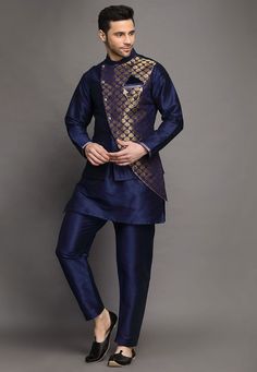 Art Silk Kurta in Navy BlueThis Readymade attire is Enhanced with Buttons. Crafted in Chinese Collar Neck and Full SleeveAvailable with an Art Silk Pajama in Navy Blue and an Art Brocade Silk Nehru Jacket in Navy BlueDo note: Brooch and Footwear shown in the image is for presentation purposes only. Half to one inch may vary in measurement. (Slight variation in actual color vs. image is possible) We sell all kinds of menswear. Mens Kurta | Mens Kurta Pajama | Mens Sherwani | Mens Sherwani Sets | Designer Indigo Sets For Festivals, Indigo Traditional Drape Set For Diwali, Indigo Festive Sets For Transitional Season, Bollywood Style Indigo Sets With Pallu, Indigo Bollywood Sets With Pallu, Bollywood Indigo Sets With Pallu, Festive Indigo Sets With Pallu, Transitional Designer Wear Blue Sets, Transitional Blue Designer Wear Sets