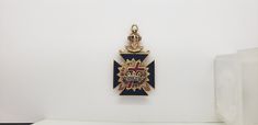 Up for sale is this Very Nice Heavy Antique 14K Solid Gold, Enamel & Rose Cut Diamond Masonic 32nd Degree Scottish Rite Freemasonry Pocket Watch Chain Fob. Circa 1900. Measures 26mm wide x 44.5mm tall. The 6 rose cut diamonds measure about 1.5mm each. The hinged eagle back opens to reveal a nicely enameled masonic symbol. The hinge is tight with no sloppiness. The latch snaps shut. The helmet is hinged. There is a chip in the enamel on the backside (see last pic). Otherwise, the enameling is in Formal Medallion Charms Jewelry, Victorian Style Formal Jewelry With Charms, Victorian Style Charms Jewelry For Formal Occasions, Elegant Commemoration Jewelry With Charms, Victorian Formal Jewelry With Charms, Victorian Charm Necklace For Formal Occasions, Victorian Style Formal Necklaces With Charms, Victorian Formal Necklace With Charms, Victorian Formal Charms Necklace