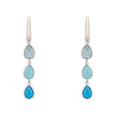 Presenting the Sardinia Triple Teardrop Earrings Silver The Blues, a symphony of azure elegance.  Each earring is adorned with a trio of teardrop gemstones - the clear sky elegance of Blue Topaz, the gentle whisper of Blue Chalcedony, and the vibrant depth of Swiss Blue Topaz, creating a cascading effect of tranquil blues that evoke the spirit of the sea and sky. Blue Chalcedony gives a feeling of light-heartedness and the ability to look forward optimistically. Blue topaz is believed to be the Blue Briolette Earrings For Formal Occasions, Blue Gemstone Teardrop Earrings For Formal Events, Elegant Blue Sterling Silver Teardrop Earrings, Blue Briolette Earrings For Wedding, Elegant Blue Sterling Silver Linear Earrings, Elegant Long Drop Blue Jewelry, Elegant Blue Teardrop Earrings For Formal Occasions, Blue Gemstone Teardrop Dangle Earrings, Elegant Turquoise Teardrop Earrings