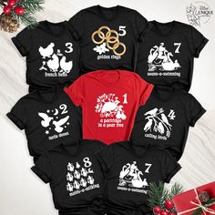 Christmas 12 Days Of Tee Shirt, 12 Days Of Christmas Family Group  Tshirts, Matching Christmas Party Gift Shirts, 12 Days Of Holiday Outfit. Celebrate the holiday spirit with our Christmas 12 Days of Tee Shirts! Perfect for family gatherings or group Christmas parties, these matching shirts bring festive fun to your celebrations. Whether you're counting down the days of Christmas or gifting them to loved ones, these tees make the perfect holiday outfit for everyone to enjoy! Hello, Welcome to Bl 12 Days Of Christmas Costume, Christmas Party Gift, Holiday Outfit, Unique Boutique, Christmas Parties, Christmas Costumes, Christmas Family, 12 Days Of Christmas, Travel Shirts