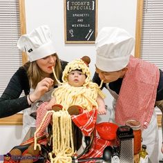 two women and a baby are dressed up as pasta characters, one is wearing a chef's hat