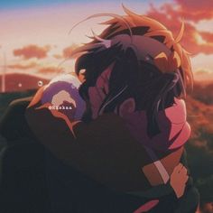 an anime scene with two people hugging each other and the sun in the sky behind them