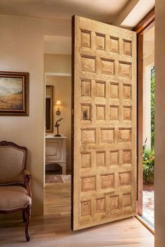 an open wooden door in a living room