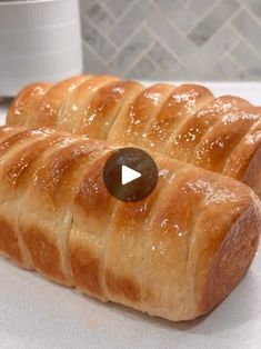 two croissants sitting on top of a counter