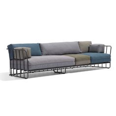 a couch that is sitting on top of a metal frame