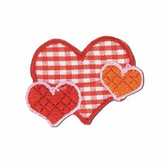 two hearts on a red and white checkered cloth