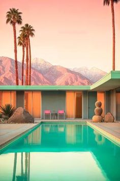 a house with a pool and mountains in the background