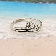 Get your orders in by Dec 10th to arrive in time for xmas...The Wave Toe Ring - Beachy and a fun ring in Sterling Silver. Wear on Midi, Pinkie or Knuckle..Also cute on your small toe... You won't believe the difference that a correctly sized toe ring makes. Our rings are complete circles Many of our customers wear them full time, round the clock. A well dressed foot is just SOOO pretty! Once you get hooked you will never go back! You will absolutely love these rings Go From Ordinary To Extraordi Summer Beach Midi Rings, Adjustable Midi Rings For Beach, Adjustable Summer Promise Rings, Adjustable Toe Rings For Summer Beach, Adjustable Toe Ring For Summer, Koa Wood Ring, Sterling Silver Toe Rings, Opal Band, Never Go Back