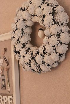 a wreath is hanging on the wall