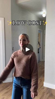 a woman standing in a living room with her hands out and the words low cost above her head