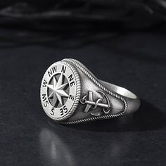 This 925K sterling silver ring, with an aged finish, features stylish engraving details. Expertly made and intricately designed, SilverGates jewelry collection is presented in an array of contemporary and classic pieces. Made with carefully selected materials. ★Item Details * Material : 925K Sterling Silver * Total weight : 10-11 Grams * Ring Diameter : 2.00 cm Compass Ring, Garnet Stone Ring, Anchor Rings, Cool Rings For Men, Christmas Gift For Men, Nautical Compass, Silver Chain For Men, Ship Wheel, Head Ring