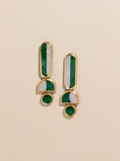 Elevate your style with our handmade multicolored dangle earrings, a must-have accessory that will infuse joy and vibrancy into any outfit.  Crafted with care and attention to detail, these lightweight earrings boast a unique two-tone design that adds a playful pop of color to your ensemble. Whether you're dressing up for a special occasion, adding a touch of flair to your everyday look, or gifting them to your favorite fashionista, these earrings are the perfect statement piece.  Key Features: Modern Green Drop Earrings, Modern Green Dangle Earrings, Modern Green Geometric Earrings, Modern Green Metal Earrings, Handmade Green Geometric Earrings, Evening Wedding, Lightweight Earrings, Modern Earrings, Light Weight Earrings